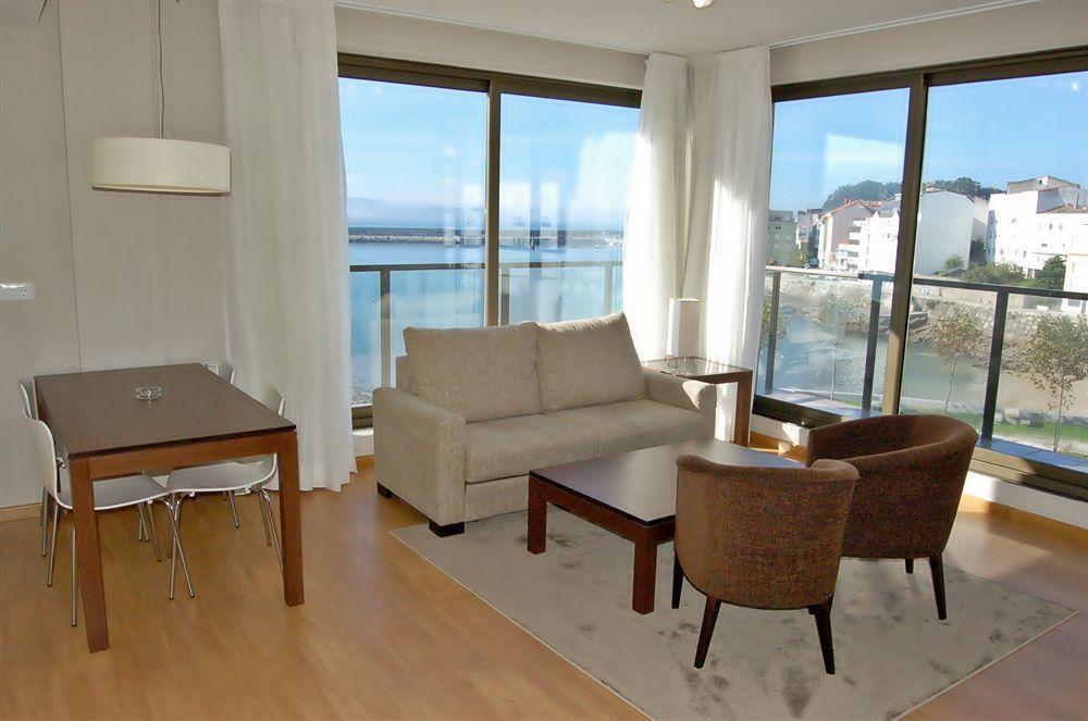 Apartamentos Turisticos Playa De Osmo Corme Екстериор снимка