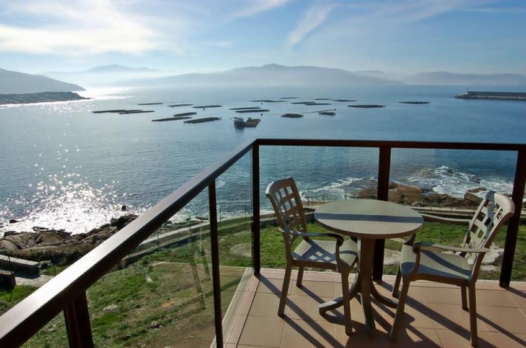 Apartamentos Turisticos Playa De Osmo Corme Екстериор снимка